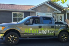 Aline-Lights-Truck-in-front-of-bungalo